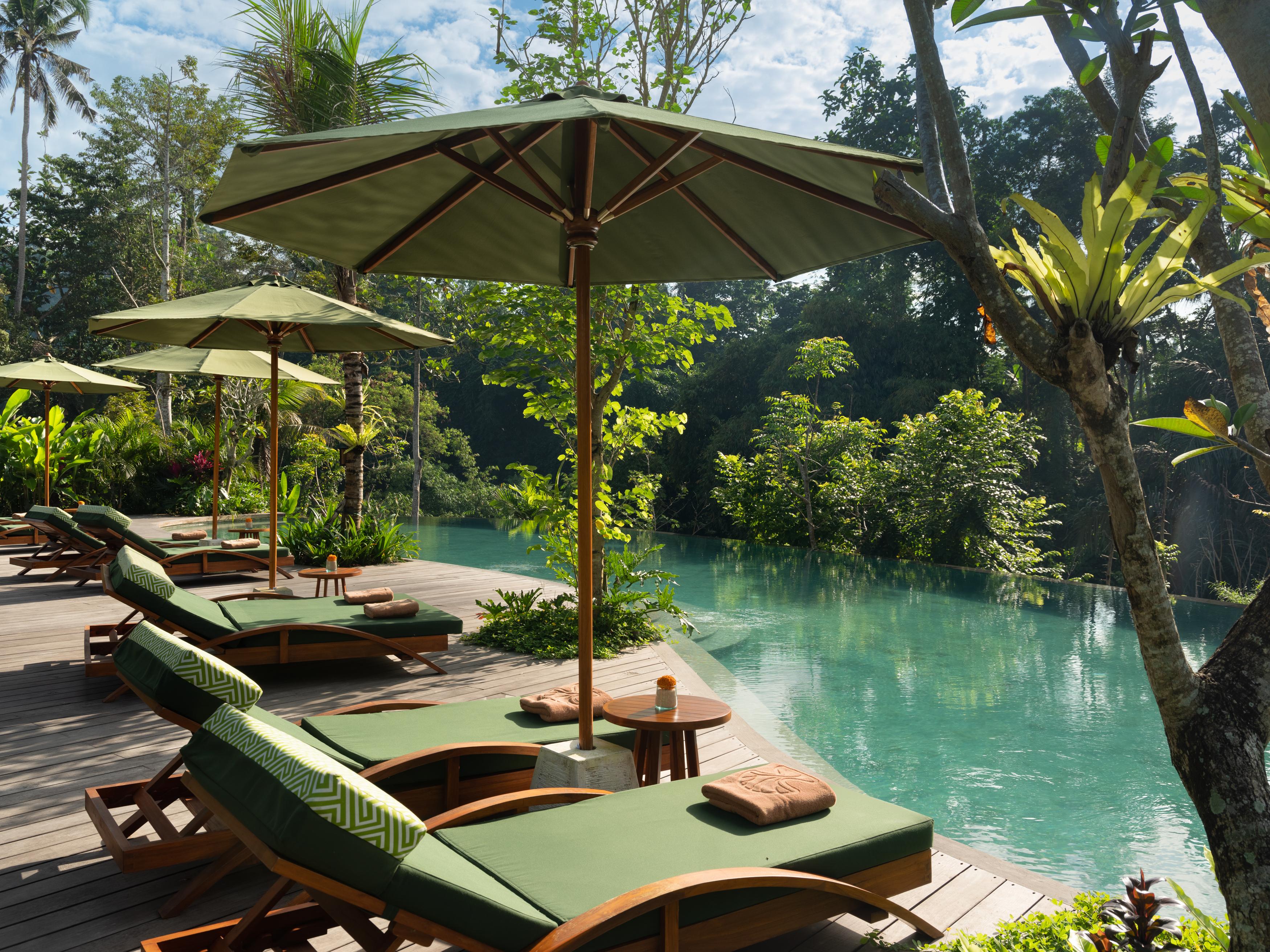 Adiwana Suweta Hotell Ubud Exteriör bild The resort's swimming pool